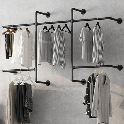 Industrial Pipe Clothing Racks by Unknown